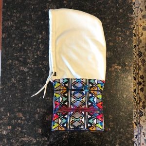 Original BUFF attached to a soft sweatshirt material hood. 100% polyester. Warm